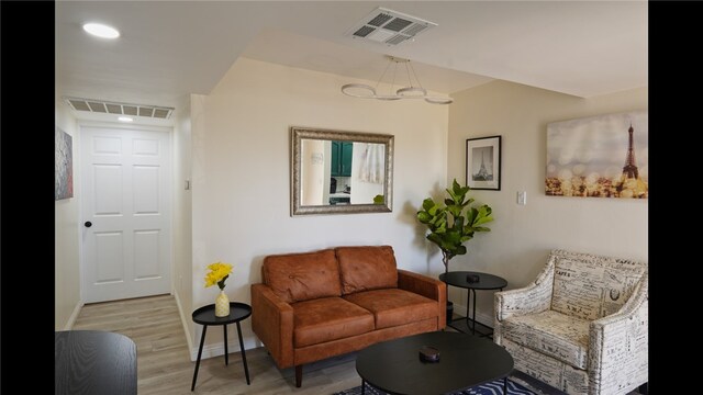 3206 Candlewood Dr, Bakersfield, CA 93306 - sitting room featuring baseboards, a notable chandelier, light wood-style flooring, and visible vents