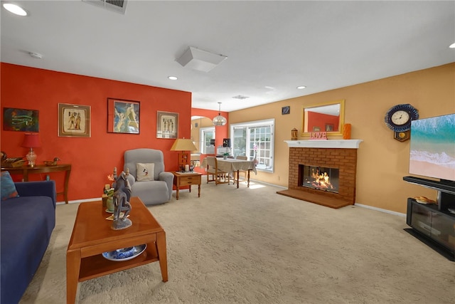 7111 Texhoma Ave, Van Nuys, CA 91406 - carpeted living room with recessed lighting, baseboards, and a fireplace