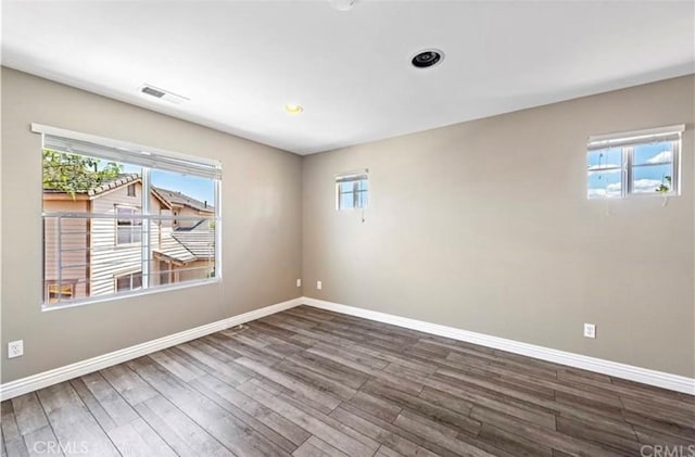 33908 Applecart Ct, Wildomar, CA 92595 - unfurnished room with baseboards and wood finished floors