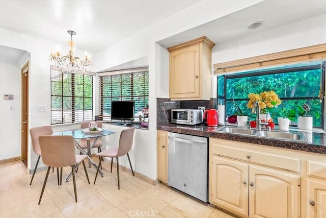 17861 Cathedral Pl, Encino, CA 91316 - kitchen featuring stainless steel appliances, a chandelier, dark countertops, and tasteful backsplash