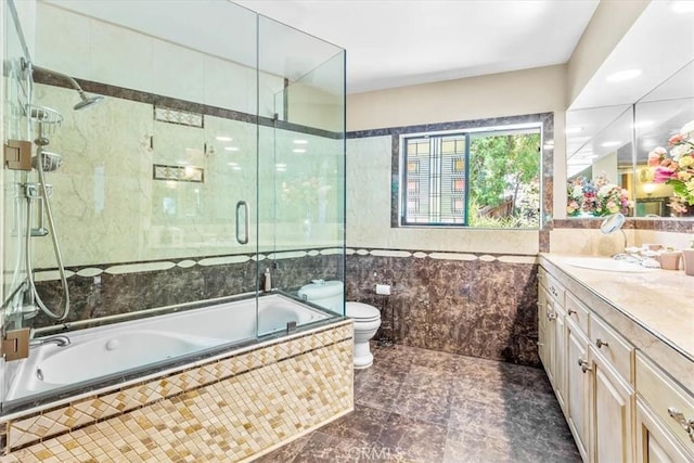 17861 Cathedral Pl, Encino, CA 91316 - full bathroom featuring tile walls, vanity, tiled shower / bath combo, and marble finish flooring