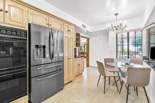 17861 Cathedral Pl, Encino, CA 91316 - kitchen featuring stainless steel refrigerator with ice dispenser, a chandelier, light brown cabinetry, light tile patterned floors, and dark countertops