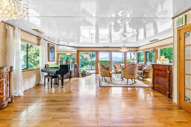 17861 Cathedral Pl, Encino, CA 91316 - sunroom / solarium featuring plenty of natural light and a chandelier