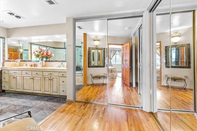 17861 Cathedral Pl, Encino, CA 91316 - full bath with wood finished floors and vanity