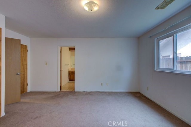 spare room with carpet flooring