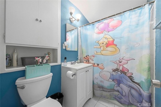 423 Landsford St, Lancaster, CA 93535 - bathroom with toilet, tile patterned floors, vanity, and a shower with shower curtain