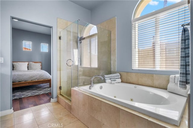 12931 Runway Rd, Playa Vista, CA 90094 - ensuite bathroom featuring a shower stall, tile patterned floors, and a jetted tub