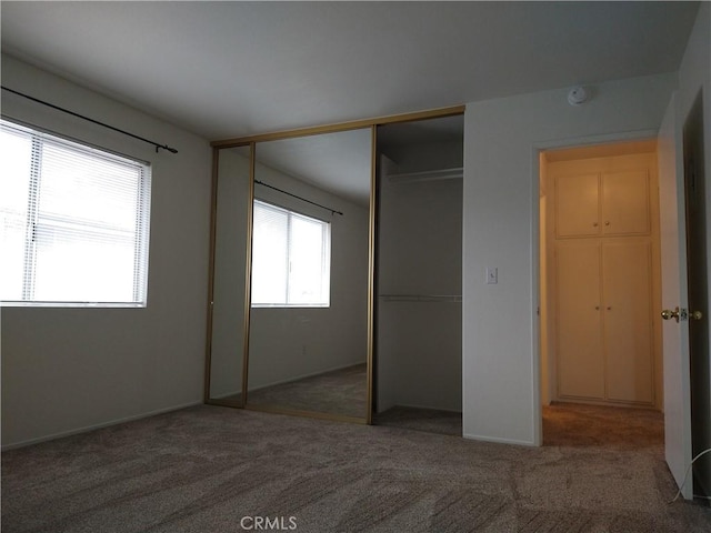 660 S Glassell St Unit 54, Orange, CA 92866 - unfurnished bedroom featuring carpet and a closet