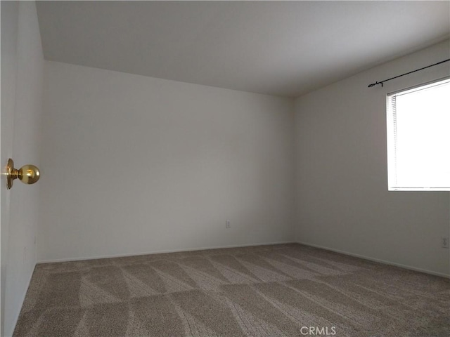 660 S Glassell St Unit 54, Orange, CA 92866 - spare room featuring carpet floors and baseboards