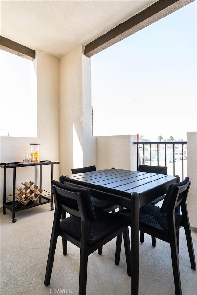 balcony featuring outdoor dining area