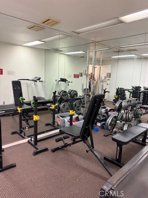 321 S San Vicente Blvd S Unit 402, Los Angeles, CA 90048 - workout area featuring visible vents and carpet