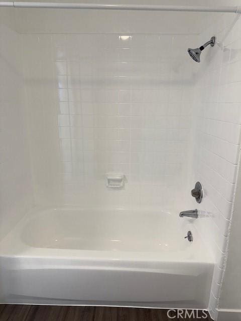 321 S San Vicente Blvd S Unit 402, Los Angeles, CA 90048 - bathroom with bathing tub / shower combination and wood finished floors