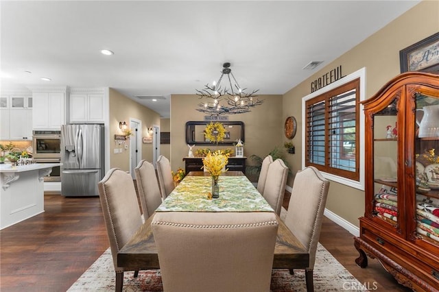 1405 Rock Ridge Dr, Lake Arrowhead, CA 92352 - dining area featuring an inviting chandelier, visible vents, baseboards, dark wood-style floors, and recessed lighting