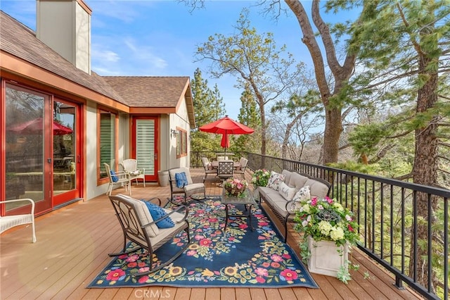 1405 Rock Ridge Dr, Lake Arrowhead, CA 92352 - wooden deck with an outdoor living space and outdoor dining space