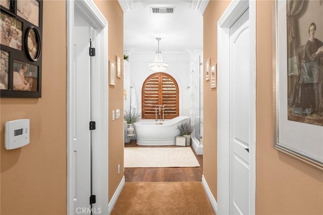 1405 Rock Ridge Dr, Lake Arrowhead, CA 92352 - hallway featuring baseboards, ornamental molding, visible vents, and carpet floors