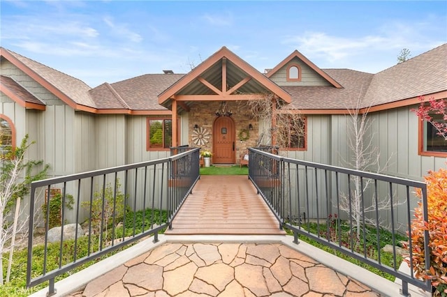 1405 Rock Ridge Dr, Lake Arrowhead, CA 92352 - view of front of house with board and batten siding and roof with shingles