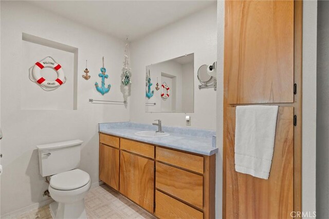 568 4th St, Willows, CA 95988 - bathroom featuring vanity and toilet