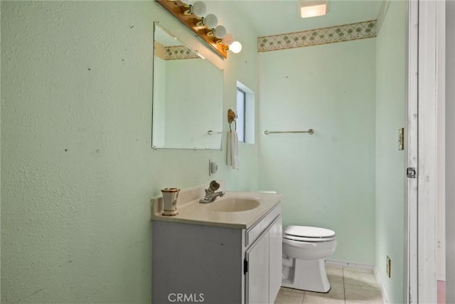 568 4th St, Willows, CA 95988 - bathroom with toilet, tile patterned flooring, and vanity