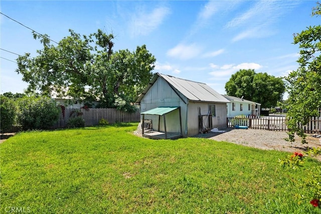 568 4th St, Willows, CA 95988 - fenced backyard featuring an outdoor structure