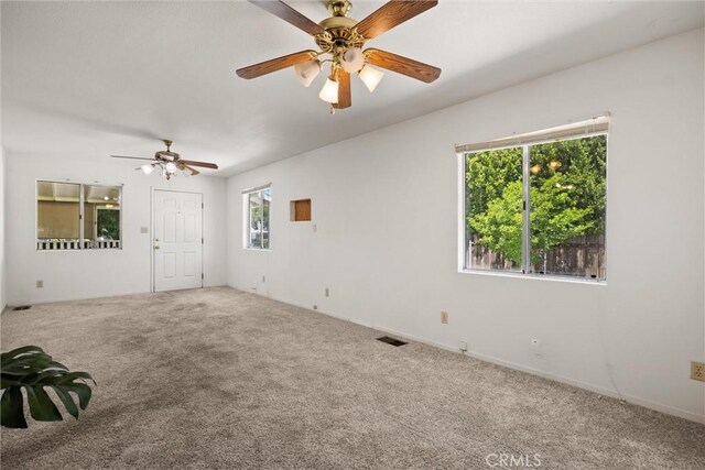 568 4th St, Willows, CA 95988 - carpeted spare room featuring healthy amount of natural light and a ceiling fan