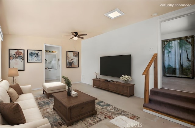 568 4th St, Willows, CA 95988 - living room featuring a ceiling fan, carpet floors, and stairs