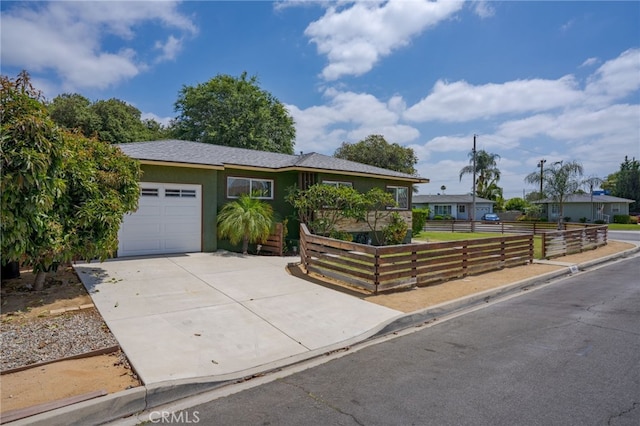 14967 Dunton Dr, Whittier, CA 90604 - single story home featuring concrete driveway, a garage, and stucco siding