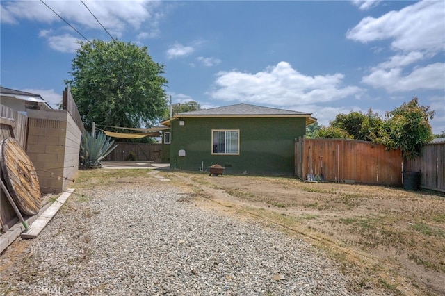 14967 Dunton Dr, Whittier, CA 90604 - rear view of house featuring a fenced backyard and a patio area