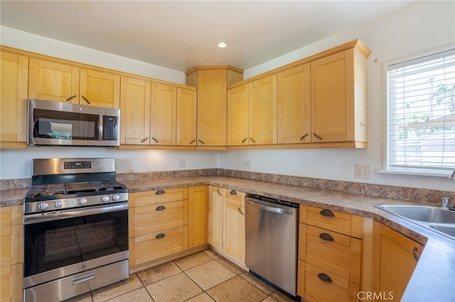 14967 Dunton Dr, Whittier, CA 90604 - kitchen with appliances with stainless steel finishes, light brown cabinetry, a sink, and recessed lighting