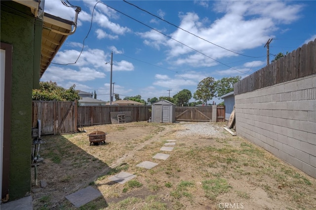 14967 Dunton Dr, Whittier, CA 90604 - fenced backyard featuring an outdoor fire pit