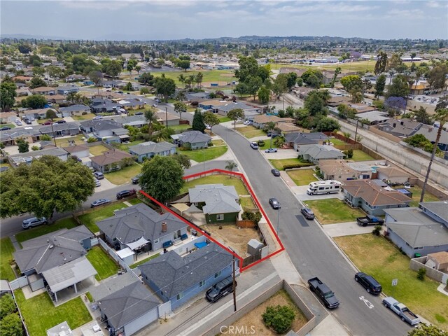 14967 Dunton Dr, Whittier, CA 90604 - aerial perspective of suburban area featuring property parcel outlined