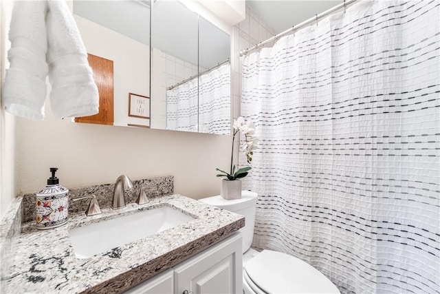 12172 Manley St, Garden Grove, CA 92845 - bathroom with toilet, vanity, and curtained shower