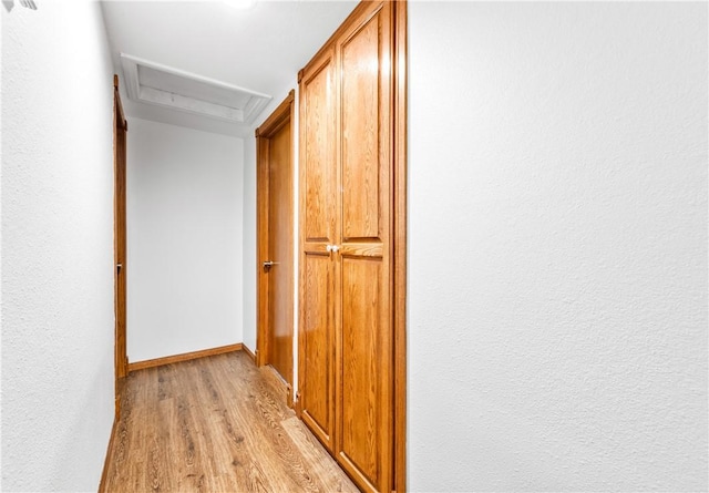12172 Manley St, Garden Grove, CA 92845 - hall with attic access, light wood-style floors, and baseboards