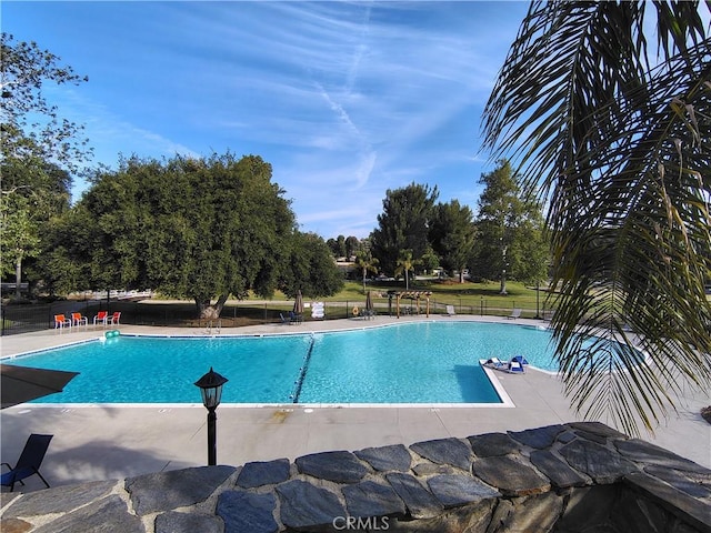 26373 Oak Highland Dr Unit E, Newhall, CA 91321 - community pool with view of wooded area and a patio