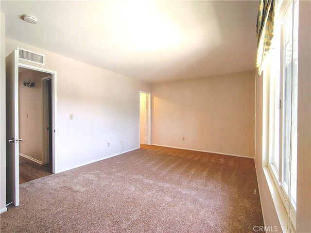 26373 Oak Highland Dr Unit E, Newhall, CA 91321 - carpeted empty room featuring baseboards and a smoke detector