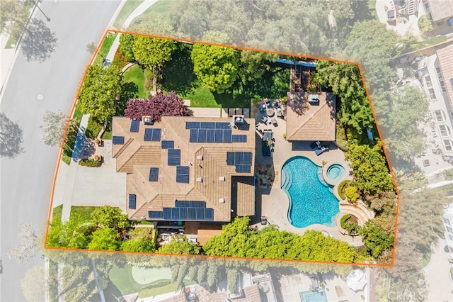 aerial view of property's location featuring a pool and property boundaries highlighted