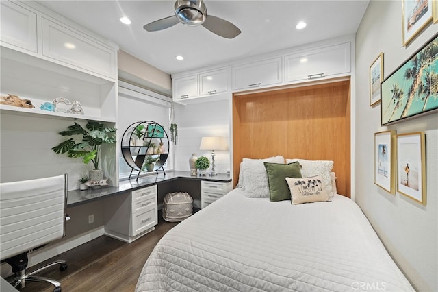 bedroom with dark wood-style floors and recessed lighting