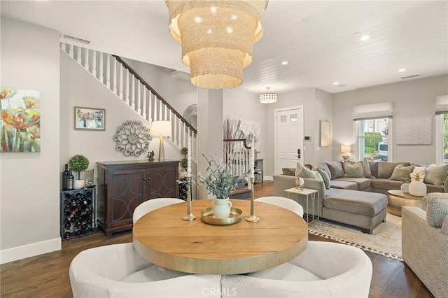 dining space with stairway, dark wood finished floors, recessed lighting, baseboards, and wood ceiling