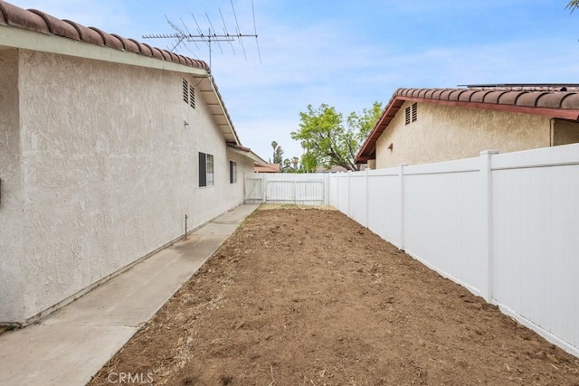25283 Menominee Ct, Moreno Valley, CA 92553 - view of yard with a fenced backyard