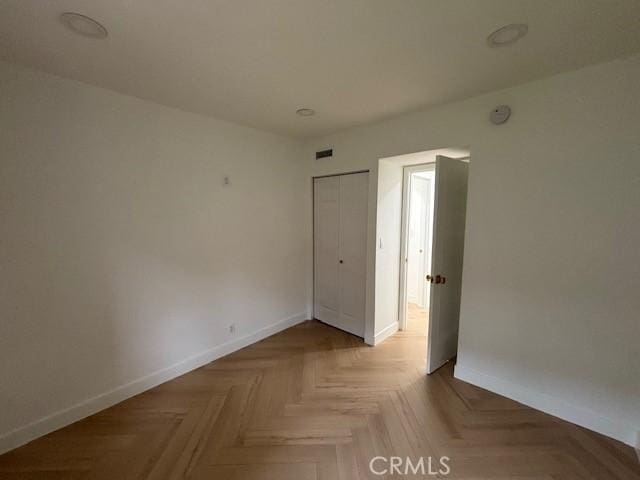 empty room with baseboards