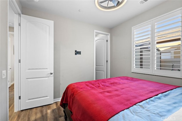 22811 Rolling Brook Ln, Wildomar, CA 92595 - bedroom with wood finished floors and baseboards