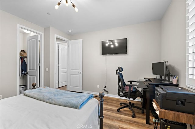 22811 Rolling Brook Ln, Wildomar, CA 92595 - bedroom featuring light wood-style flooring, a desk, and baseboards