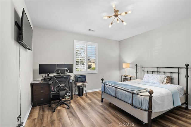 22811 Rolling Brook Ln, Wildomar, CA 92595 - bedroom with a chandelier, an office area, baseboards, and wood finished floors