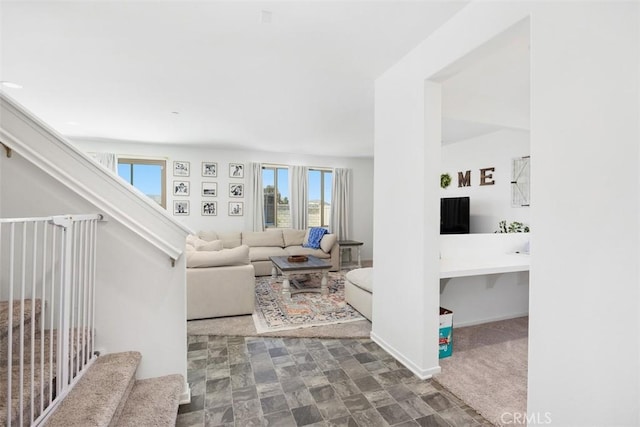 4872 Goldfinch St, Hemet, CA 92545 - living area featuring healthy amount of natural light, stairway, and baseboards
