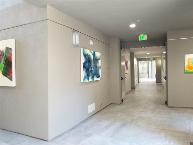 corridor featuring recessed lighting