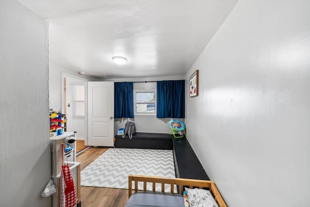 bedroom with wood finished floors