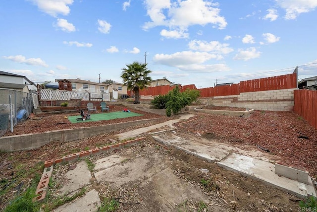 view of yard with a fenced backyard and a patio area
