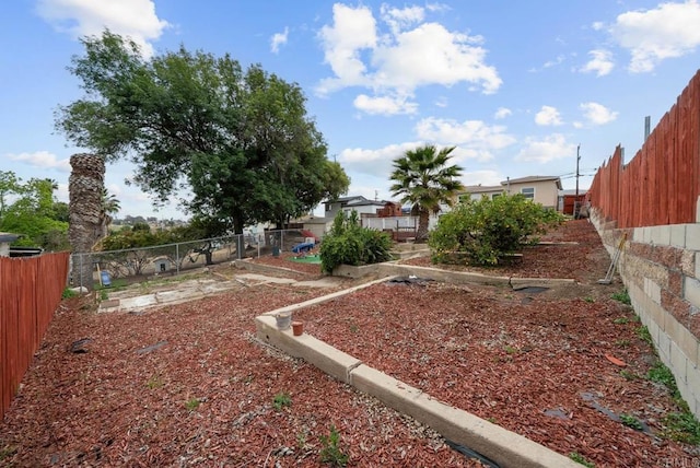 view of yard featuring fence