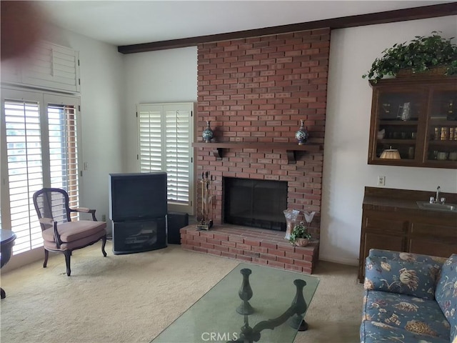 100 S Lucia Ave Unit 1, Redondo Beach, CA 90277 - living room with carpet floors and a brick fireplace