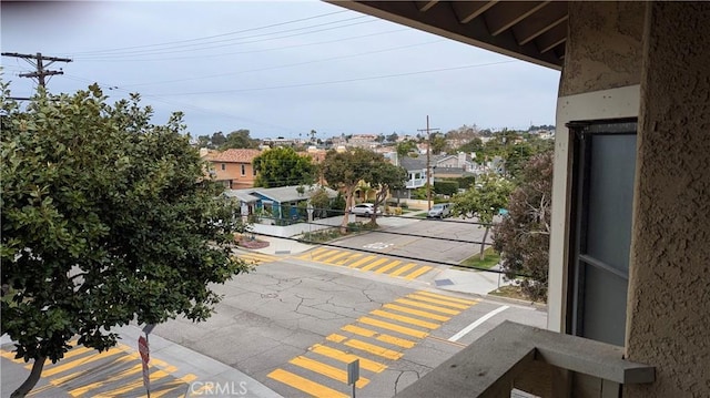 100 S Lucia Ave Unit 1, Redondo Beach, CA 90277 - view of asphalt road with sidewalks, curbs, and a residential view