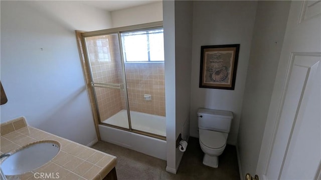 100 S Lucia Ave Unit 1, Redondo Beach, CA 90277 - bathroom featuring toilet, enclosed tub / shower combo, vanity, and baseboards
